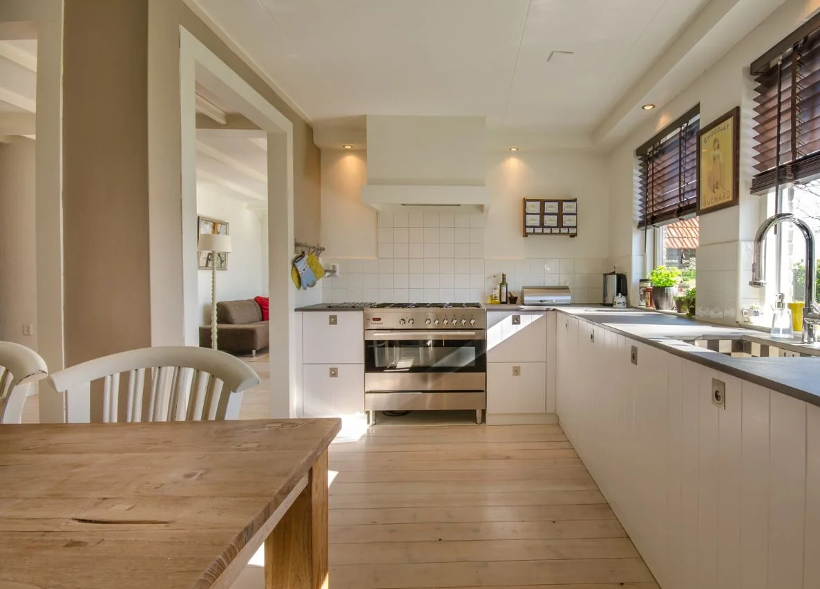 kitchen with beautiful light brown wooden furniture ready to be used as a property for sale in bali